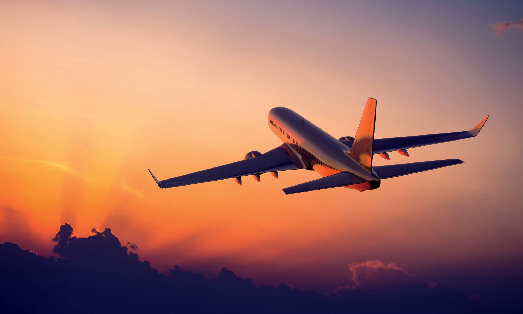 International airliner at sunset